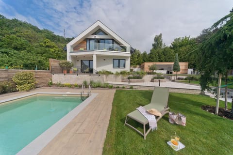 Property building, Natural landscape, Garden view, Pool view