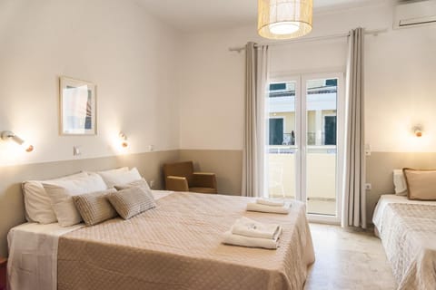 Bed, Photo of the whole room, Bedroom, towels, air conditioner