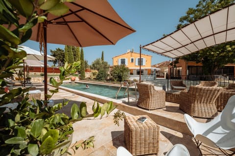 Patio, Day, Pool view, sunbed