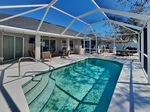 Patio, BBQ facilities, Seating area, Swimming pool