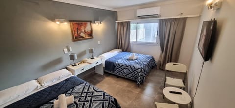 Photo of the whole room, Bedroom, towels, air conditioner