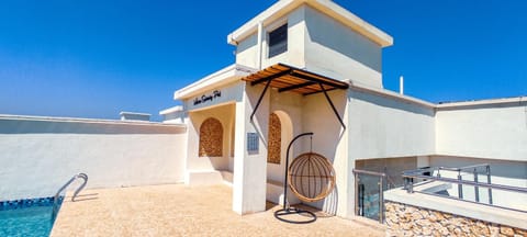 Property building, Patio, Day, View (from property/room), Balcony/Terrace, Pool view, Swimming pool, sunbed