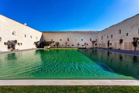 Property building, Patio, Day, Pool view, Swimming pool