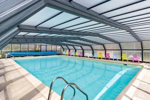 Property building, Living room, Swimming pool