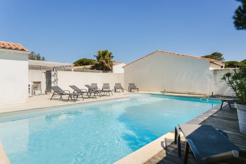 Property building, Living room, Swimming pool