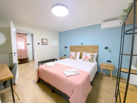 Bed, Photo of the whole room, Bedroom, towels, air conditioner