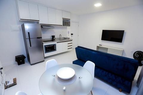 TV and multimedia, Kitchen or kitchenette, Living room, Seating area, Dining area, oven, stove, toaster
