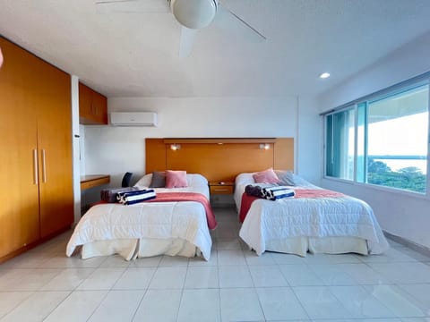 Bed, Photo of the whole room, Bedroom, towels, air conditioner