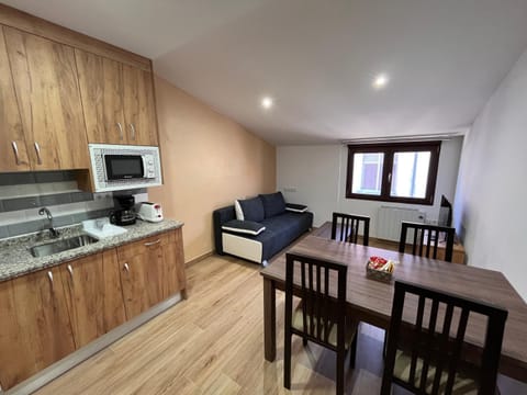Bed, Kitchen or kitchenette, Living room, Seating area, Dining area, stove