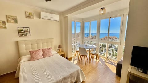 Bed, Natural landscape, View (from property/room), Bedroom, City view, Sea view, air conditioner
