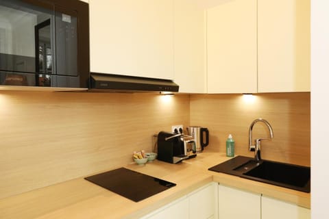 Kitchen or kitchenette, microwave