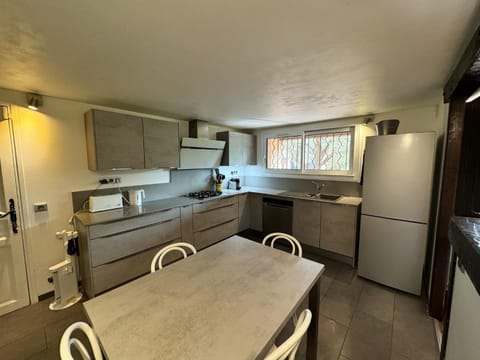 Kitchen or kitchenette, Dining area, dishwasher, stove, toaster