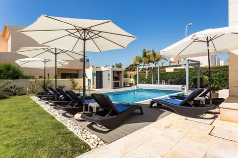 Property building, Living room, Swimming pool