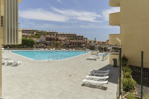 Property building, Living room, Swimming pool