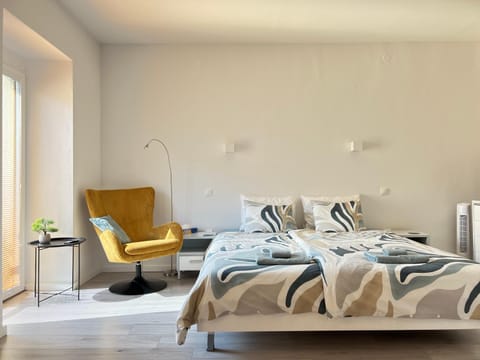 Bed, Seating area, Bedroom