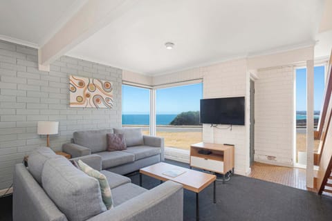 TV and multimedia, View (from property/room), Living room, Seating area, Sea view