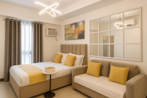 Bed, Living room, Seating area, Bedroom, air conditioner