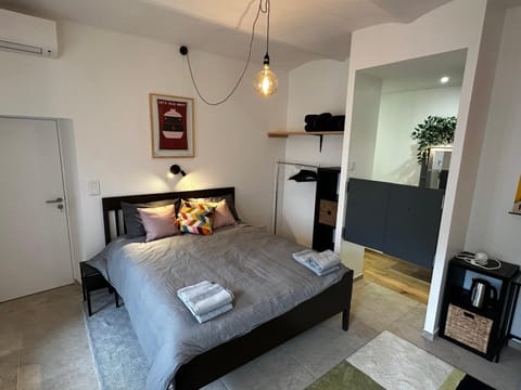 Bed, Bedroom, towels, air conditioner