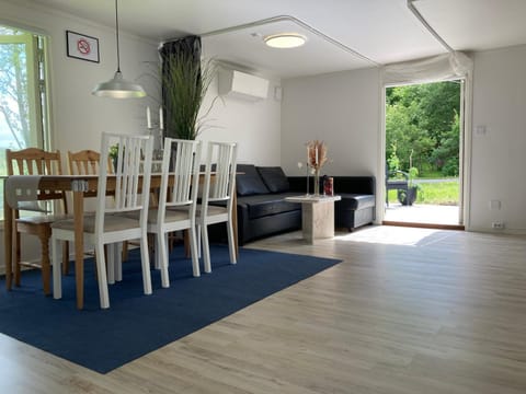 Patio, Living room, Seating area, Dining area, Garden view, kitchen, air conditioner