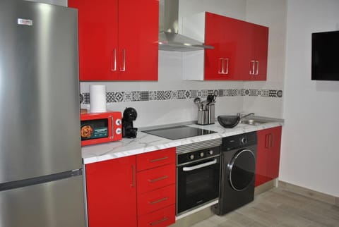 Kitchen or kitchenette, oven, stove, toaster