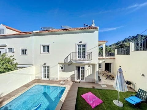 Property building, Patio, Garden, View (from property/room), Balcony/Terrace, Garden view, Swimming pool, sunbed