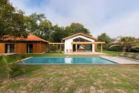 Property building, Pool view, Swimming pool, sunbed