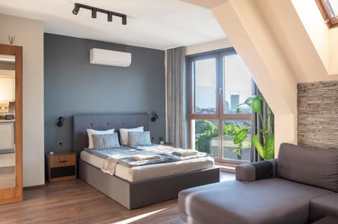 Bed, Living room, Photo of the whole room, Seating area, Bedroom, towels, air conditioner