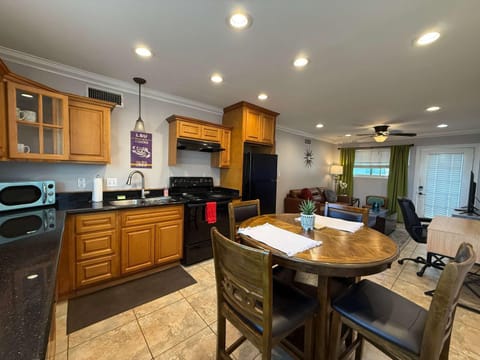 Kitchen or kitchenette, Living room, Photo of the whole room, Dining area, dishwasher, microwave, oven, stove, toaster