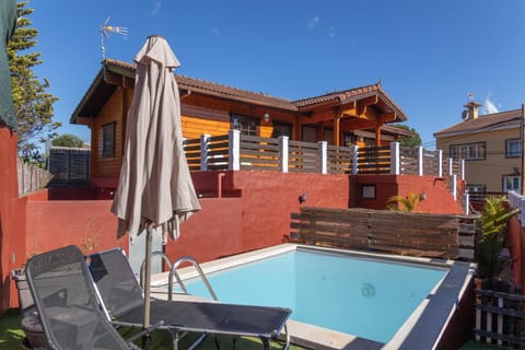 Property building, Living room, Swimming pool