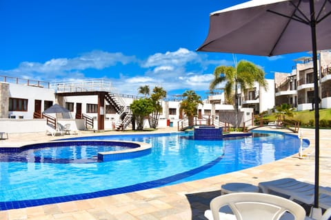 Property building, Day, Pool view, Swimming pool, sunbed