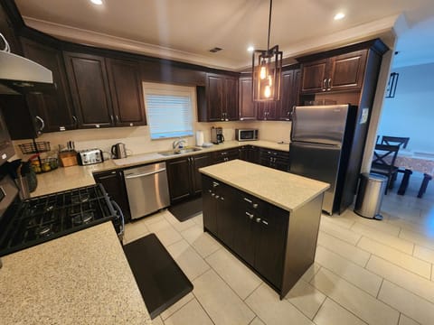 Kitchen or kitchenette, Dining area, dishwasher, oven, stove, toaster