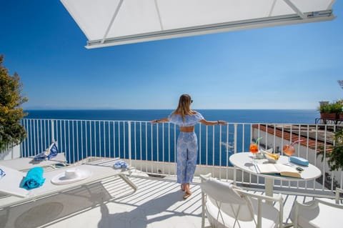 Day, People, Natural landscape, View (from property/room), Balcony/Terrace, Seating area, Guests, Sea view