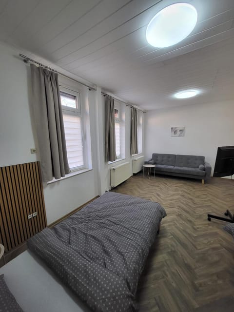 Bed, Seating area, Bedroom