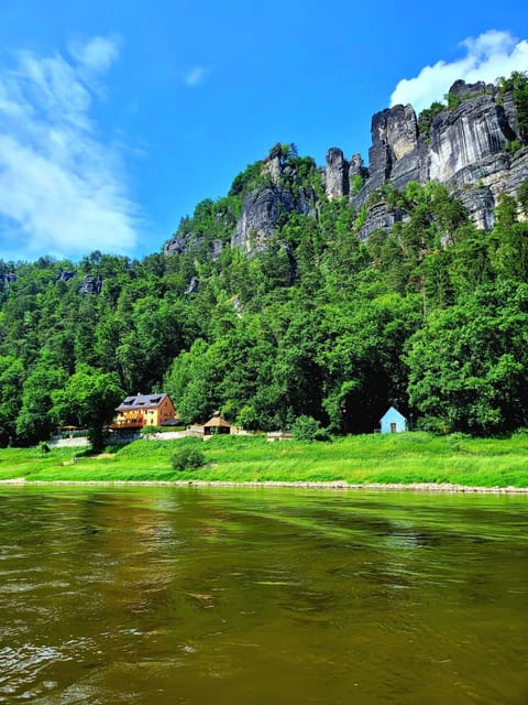 Property building, Nearby landmark, Restaurant/places to eat, Natural landscape, River view