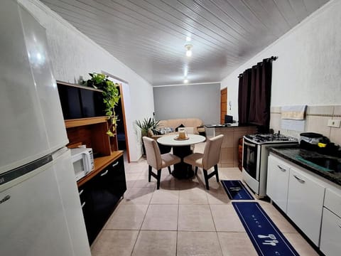 Dining area, minibar, oven, stove