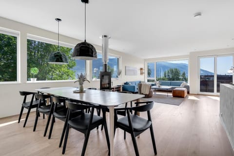 View (from property/room), Living room, Seating area, Dining area, fireplace