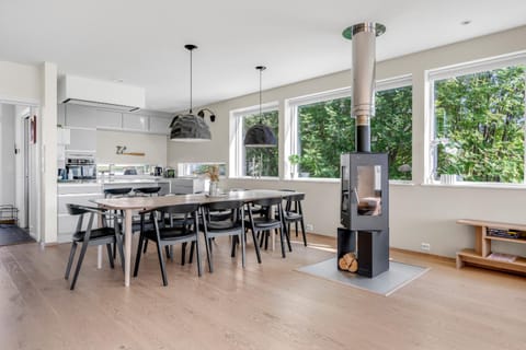 View (from property/room), Kitchen or kitchenette, Seating area, Dining area, Garden view, fireplace