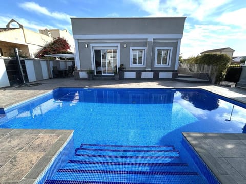 Property building, Pool view, Swimming pool, sunbed