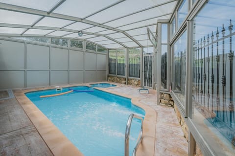 Property building, Living room, Swimming pool