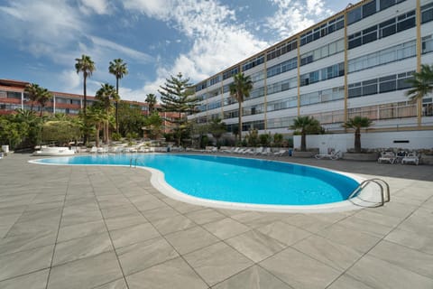 Property building, Living room, Swimming pool