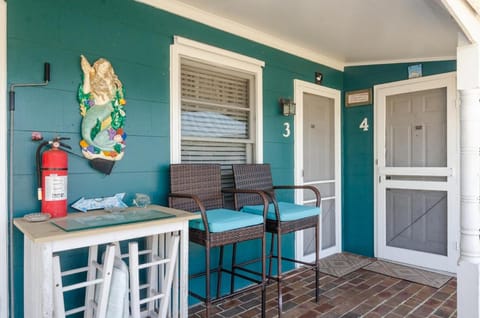The Egret Hidden Treasure Inn Room 3 by Bryant Real Estate House in Kure Beach