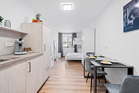 Kitchen or kitchenette, Seating area, Dining area, stove