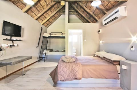 Bed, Photo of the whole room, Bedroom, bunk bed, towels, air conditioner
