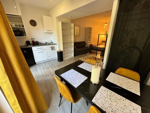 Kitchen or kitchenette, Dining area, microwave, storage, stove