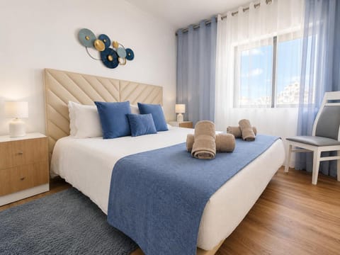 Bedroom, towels, wardrobe, air conditioner