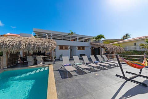 Property building, Day, Pool view, Swimming pool, sunbed