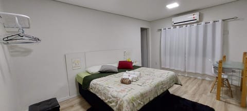 Bed, Photo of the whole room, Bedroom, towels, air conditioner