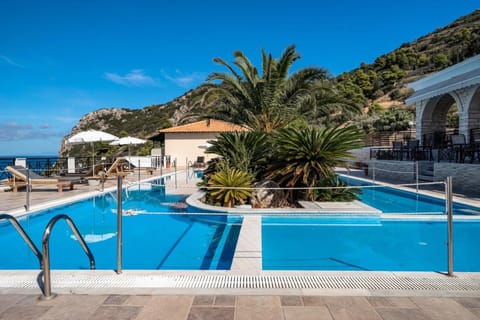 Property building, Living room, Swimming pool