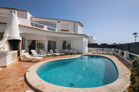 Property building, Living room, Swimming pool