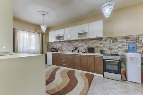 Kitchen or kitchenette, dishwasher, oven, stove, toaster